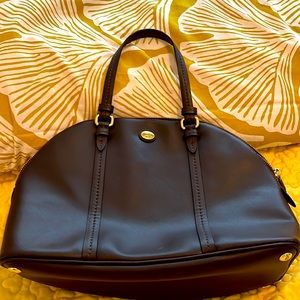 Coach brown leather. Barely used. Like new.